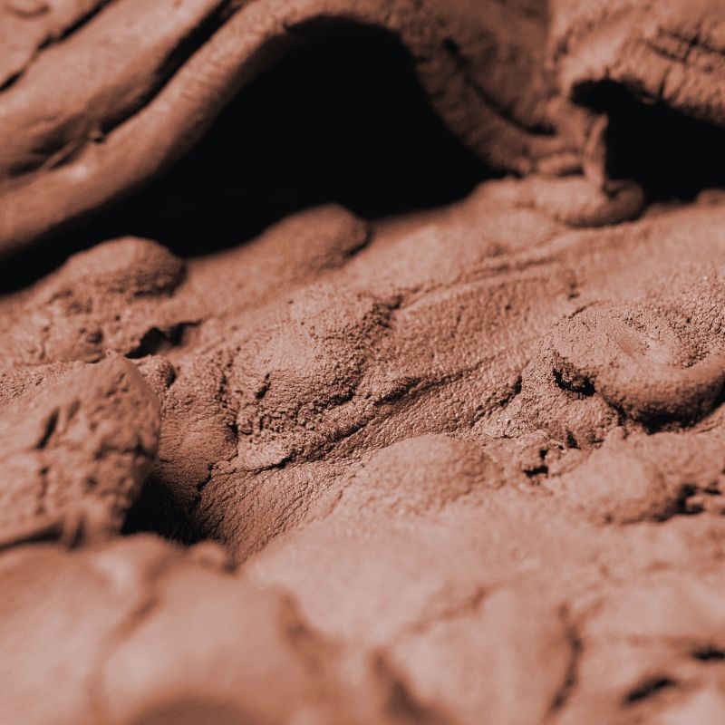 Close-up view of clay body material surface.